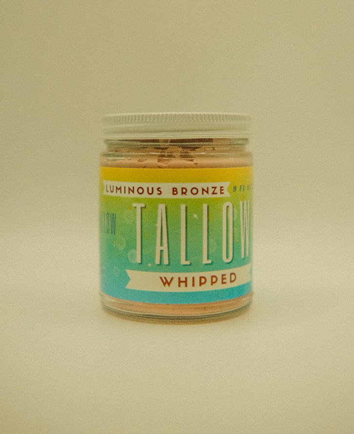 Luminous bronze whipped tallow body butter with subtle shimmer
