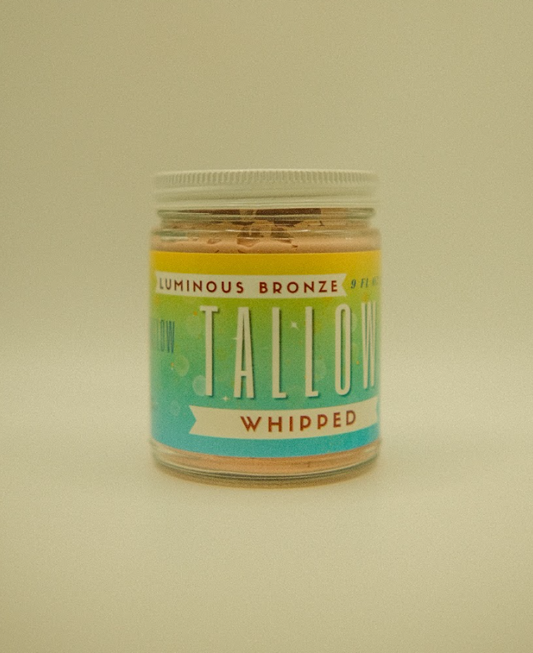 Luminous bronze whipped tallow body butter with subtle shimmer