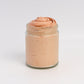 Applying bronze whipped tallow to skin for a natural sunlit glow
